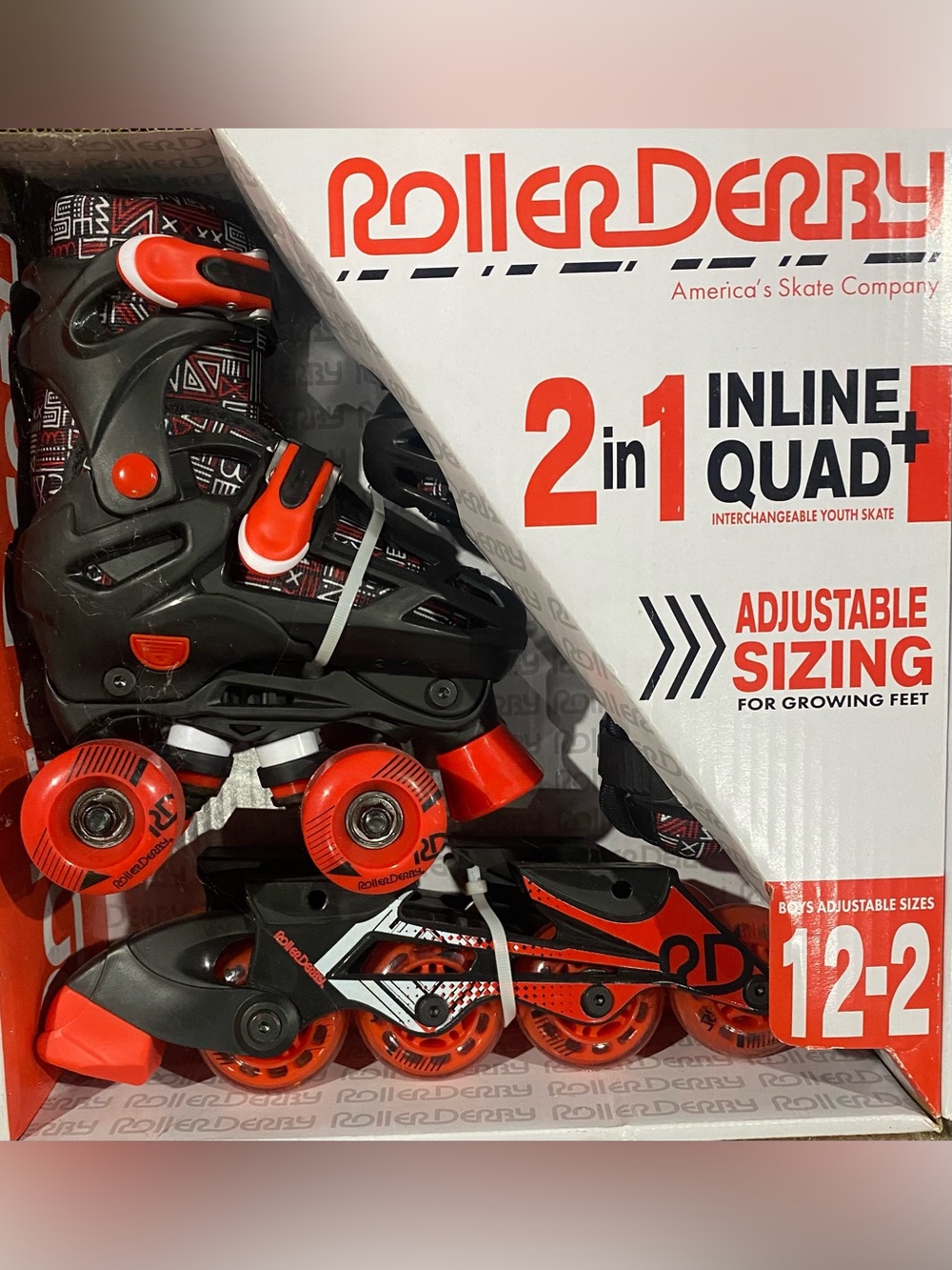 New in box- Roller Derby Kids 2-in-1 Adjustable Skates in Black and Red
